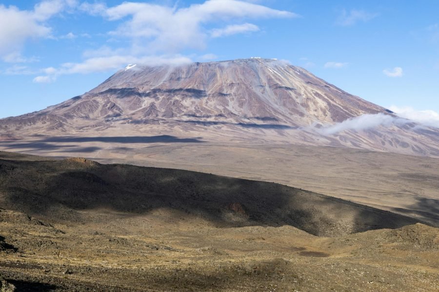 mountain with lush vegetation and blue sky